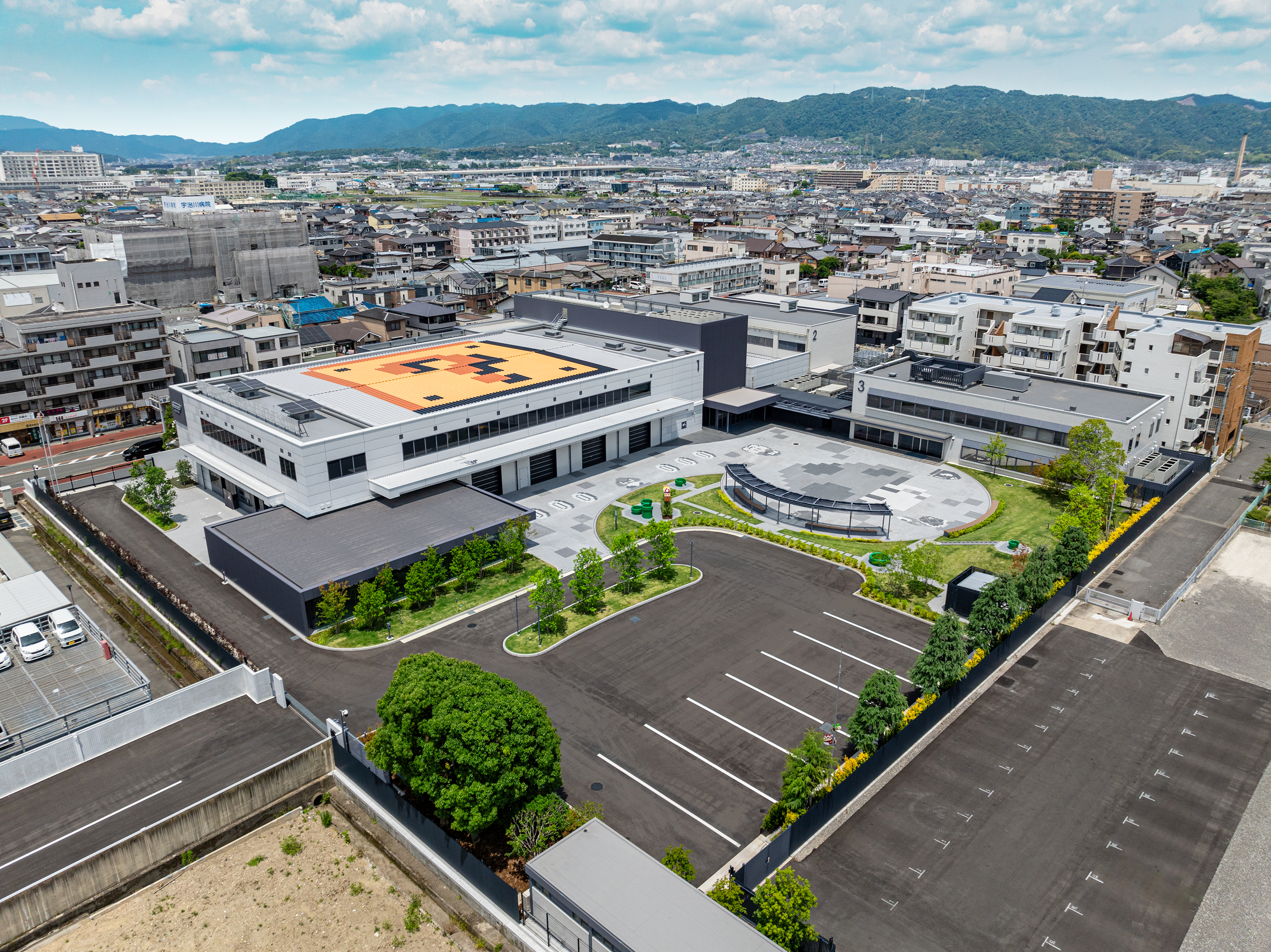 images/_news/2024/0820_nintendo_museum/NintendoMuseum_03_Exterior_Bird_eye_view_of_the_South-west_side.png